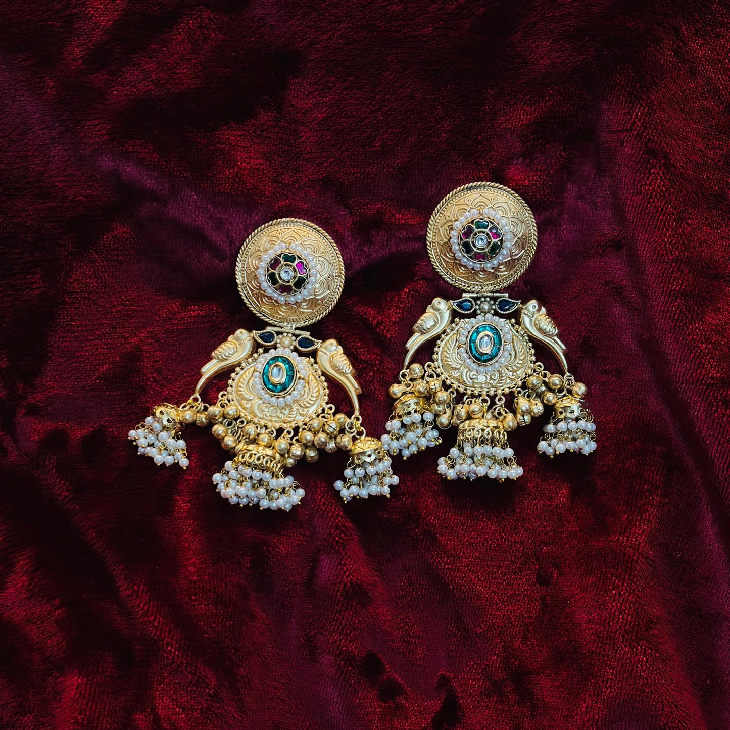 ZIVA Brass Green Stone Jhumka Earrings with Pearl Drops