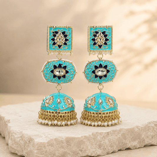 Turquoise dome jhumki earrings with square kundan tops, oval blue halos, and pearl jhum dangles.