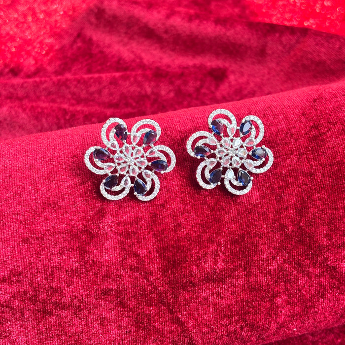 Vionne Six Petal Blue Stone American Diamond Earrings