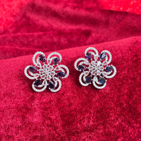 Vionne Six Petal Blue Stone American Diamond Earrings