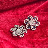 Vionne Six Petal Blue Stone American Diamond Earrings