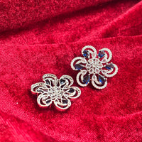 Vionne Six Petal Blue Stone American Diamond Earrings