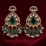 Gold teardrop chandelier earrings with green oval stone, white teardrop rhinestones, pearl bead tassels