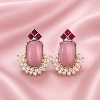 Pink rectangular stone stud earrings with red square accents and pearl bead fringe