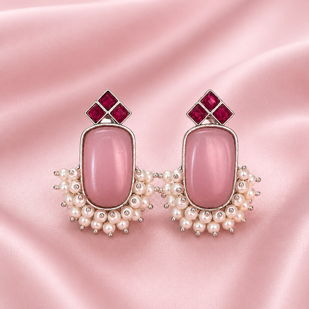 Pink rectangular stone stud earrings with red square accents and pearl bead fringe