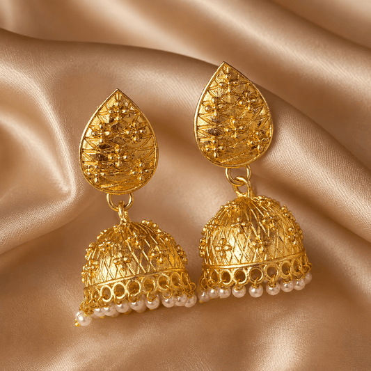 Gold-tone teardrop jhumka earrings with pearl dangle drops and textured dome