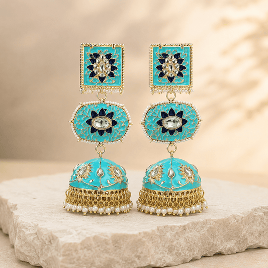 Turquoise dome jhumki earrings with square kundan tops, oval blue halos, and pearl jhum dangles.