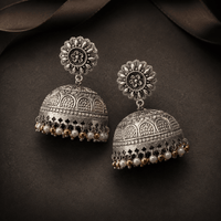 Silver-tone engraved dome jhumki earrings with round floral top and beaded drops