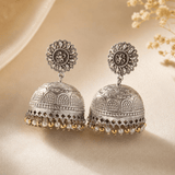Silver-tone floral jhumki dome earrings with mixed pearl and gold bead tassels
