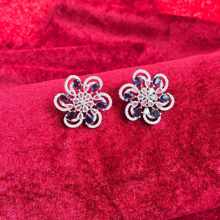 Vionne Six Petal Blue Stone American Diamond Earrings